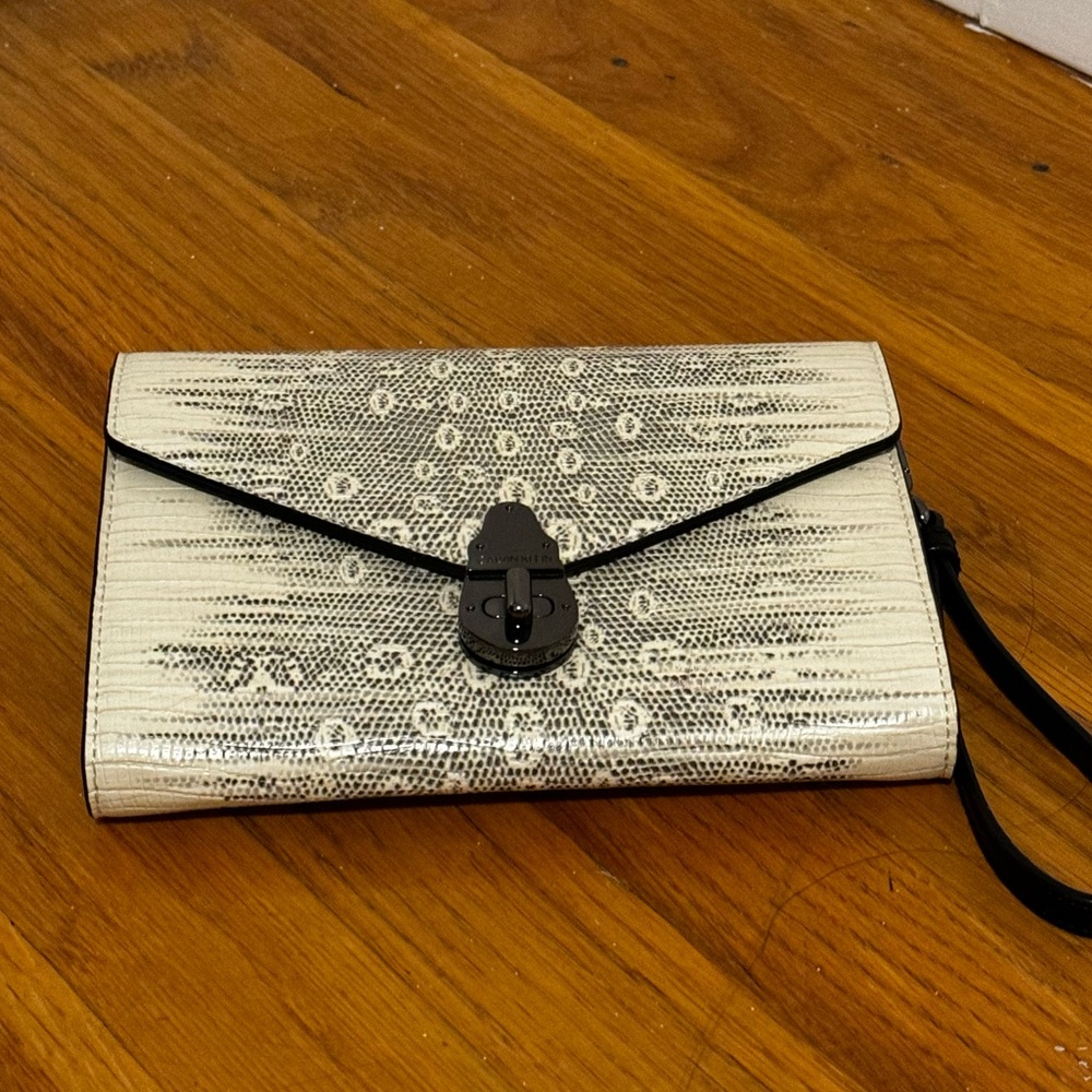 White and black clutch and shoulder bag